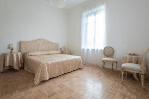 Postel nebo postele na pokoji v ubytování Atrium Verona