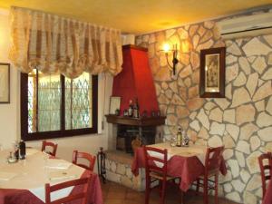 Restaurace v ubytování Hotel Le Badie