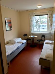 Postel nebo postele na pokoji v ubytování STF Malmfältens Folkhögskola