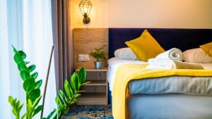 Postel nebo postele na pokoji v ubytování Plaża Resort Łeba + 37 fotografií