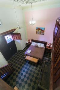 an overhead view of a bedroom with a bed at Hotel Casa del Consulado in Granada