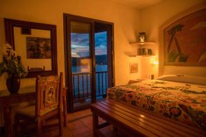 Кровать или кровати в номере La Casa Que Canta