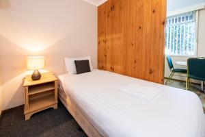 Postel nebo postele na pokoji v ubytování Silver Hills Motel