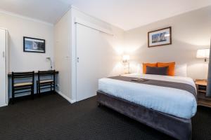 Postel nebo postele na pokoji v ubytování Silver Hills Motel