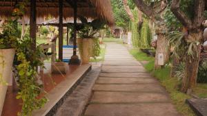 Zahrada ubytování Taman Sari Bali Resort and Spa