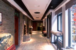 Зображення з фотогалереї помешкання Aroma Tea House Former Jing Guan Ming Lou Museum Hotel у місті Ґуйлінь