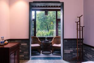Зображення з фотогалереї помешкання Aroma Tea House Former Jing Guan Ming Lou Museum Hotel у місті Ґуйлінь