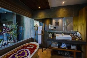 Kuchyň nebo kuchyňský kout v ubytování Purana Suite Ubud