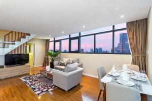 Χώρος καθιστικού στο The One Sai Gon Serviced Apartment