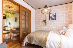 Кровать или кровати в номере Bijou Suites Forest