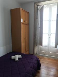 Ein Bett oder Betten in einem Zimmer der Unterkunft PR Paz de Agra