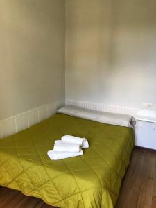 Ein Bett oder Betten in einem Zimmer der Unterkunft PR Paz de Agra
