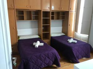 Ein Bett oder Betten in einem Zimmer der Unterkunft PR Paz de Agra