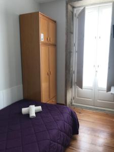 Ein Bett oder Betten in einem Zimmer der Unterkunft PR Paz de Agra