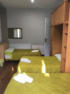 Ein Bett oder Betten in einem Zimmer der Unterkunft PR Paz de Agra