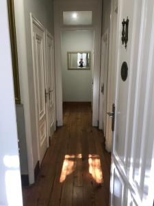 a room with a door leading to a hallway at PR Pazo de Agra in Santiago de Compostela