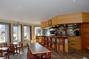 Kuchyň nebo kuchyňský kout v ubytování Hotel Gai Relais