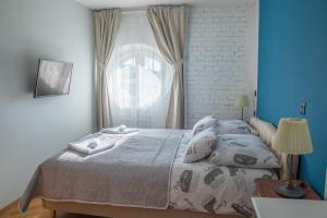 Postel nebo postele na pokoji v ubytování Domestic House Lola