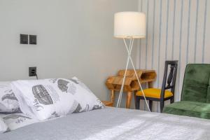 Postel nebo postele na pokoji v ubytování Domestic House Lola