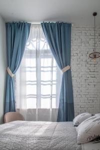 Postel nebo postele na pokoji v ubytování Domestic House Lola