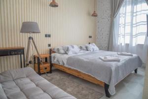 Postel nebo postele na pokoji v ubytování Domestic House Lola