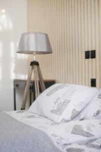 Postel nebo postele na pokoji v ubytování Domestic House Lola
