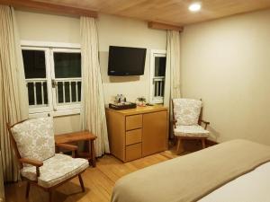 Kuchyň nebo kuchyňský kout v ubytování Hotel Toriba