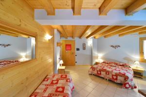 Postel nebo postele na pokoji v ubytování Hotel L'espoir