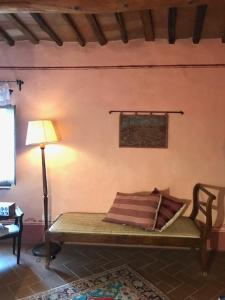 Postel nebo postele na pokoji v ubytování La Locanda del Loggiato