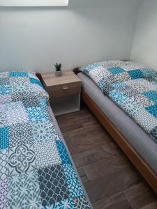 Postel nebo postele na pokoji v ubytování U Matěje