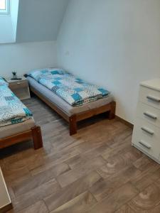 Postel nebo postele na pokoji v ubytování U Matěje