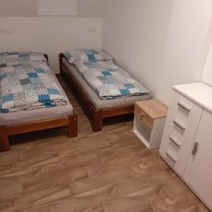 Postel nebo postele na pokoji v ubytování U Matěje