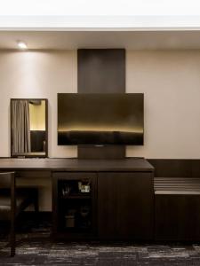Een TV en/of entertainmentcenter bij KKR Hotel Osaka
