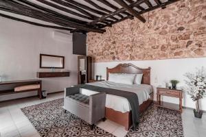 Postel nebo postele na pokoji v ubytování Hotel Colonial Zaci by GuruHotel + 28 fotografií
