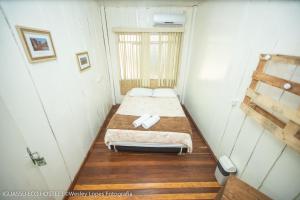 Cama ou camas em um quarto em IguassuEcoHostel - Eco Suítes - Hostel mais próximo das Cataratas