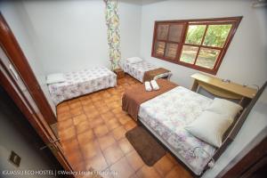 Cama ou camas em um quarto em IguassuEcoHostel - Eco Suítes - Hostel mais próximo das Cataratas