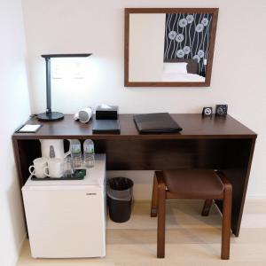 Kuchyň nebo kuchyňský kout v ubytování Cozy Inn OTARU