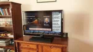 A television and/or entertainment centre at Sofia Apartment Kázmér