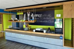 Kuchyň nebo kuchyňský kout v ubytování Ibis budget Brest Sud Plougastel - Hôtel rénové