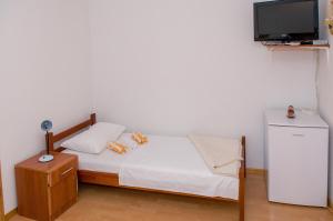 Postel nebo postele na pokoji v ubytování Apartments Anita