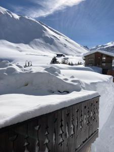 Beau Chalet rénové vue lac Tignes om vinteren