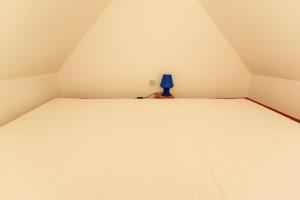 Un pat sau paturi într-o cameră la Kehrwieder