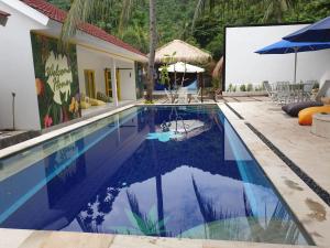 Swimming pool sa o malapit sa Nipah Villas