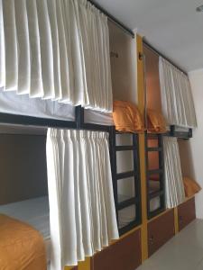 Kama o mga kama sa kuwarto sa Nipah Villas