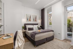 Posteľ alebo postele v izbe v ubytovaní Saint Vitus Apartments with balcony