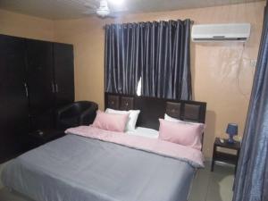 Katil atau katil-katil dalam bilik di StayCation Suites And Apartment
