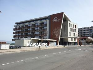 an empty street in front of a large building at PARADISO 311 Private Studio Nesebar in Nesebar
