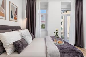 Posteľ alebo postele v izbe v ubytovaní Saint Vitus Apartments with balcony