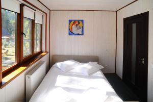 Postel nebo postele na pokoji v ubytování Hotel Galushko