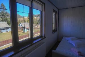 Postel nebo postele na pokoji v ubytování Hotel Galushko